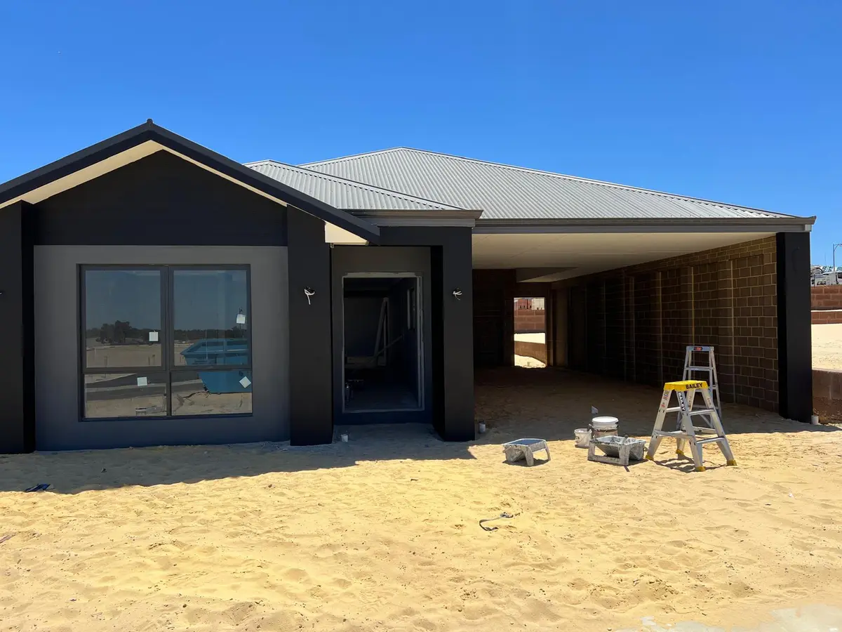 Freshly painted new build exterior in charcoal and grey